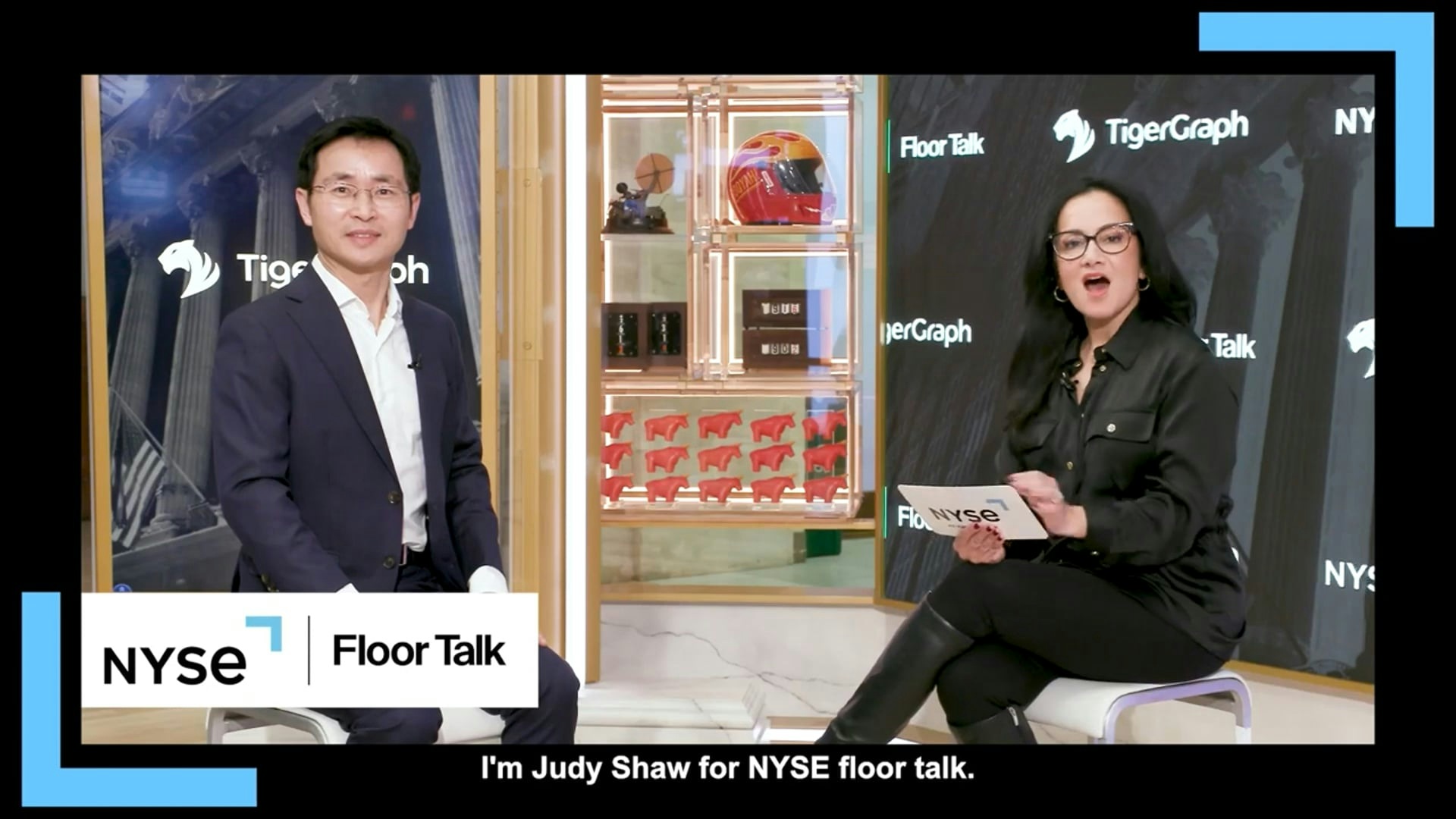Yu Xu seated on the left during a TigerGraph interview with Judy Shaw for NYSE Floor Talk