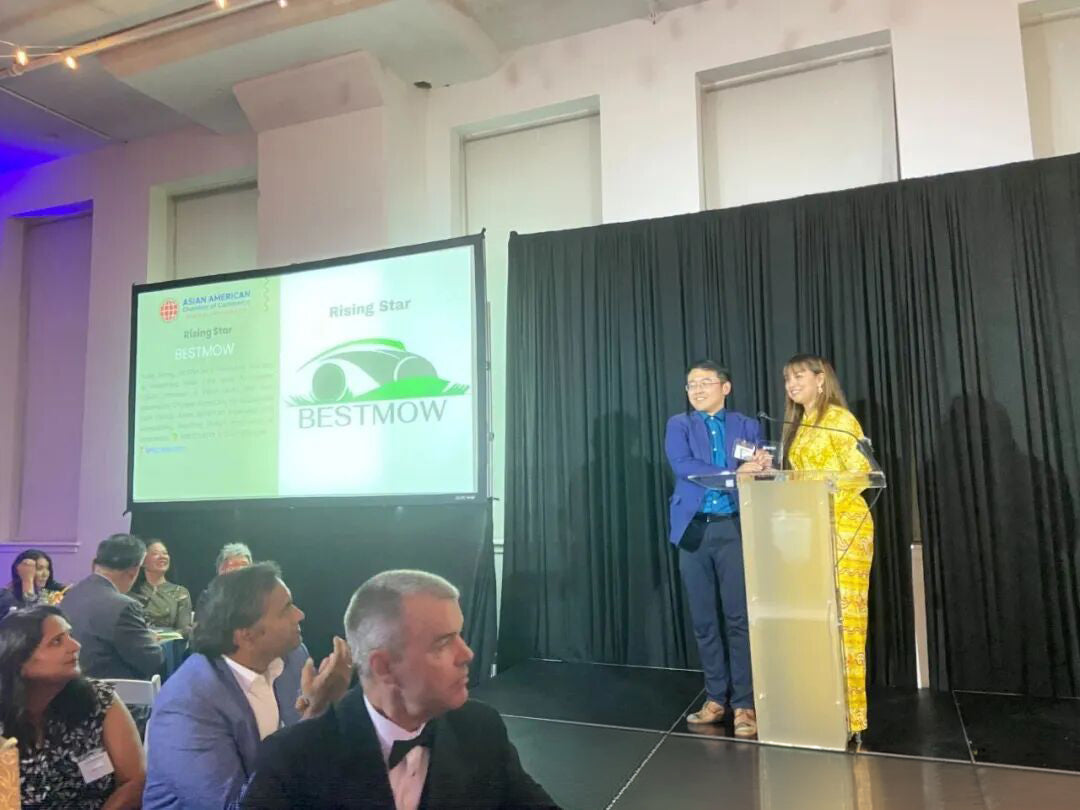 Yulai Weng accepting a Rising Star Award onstage at a Philadelphia chamber event