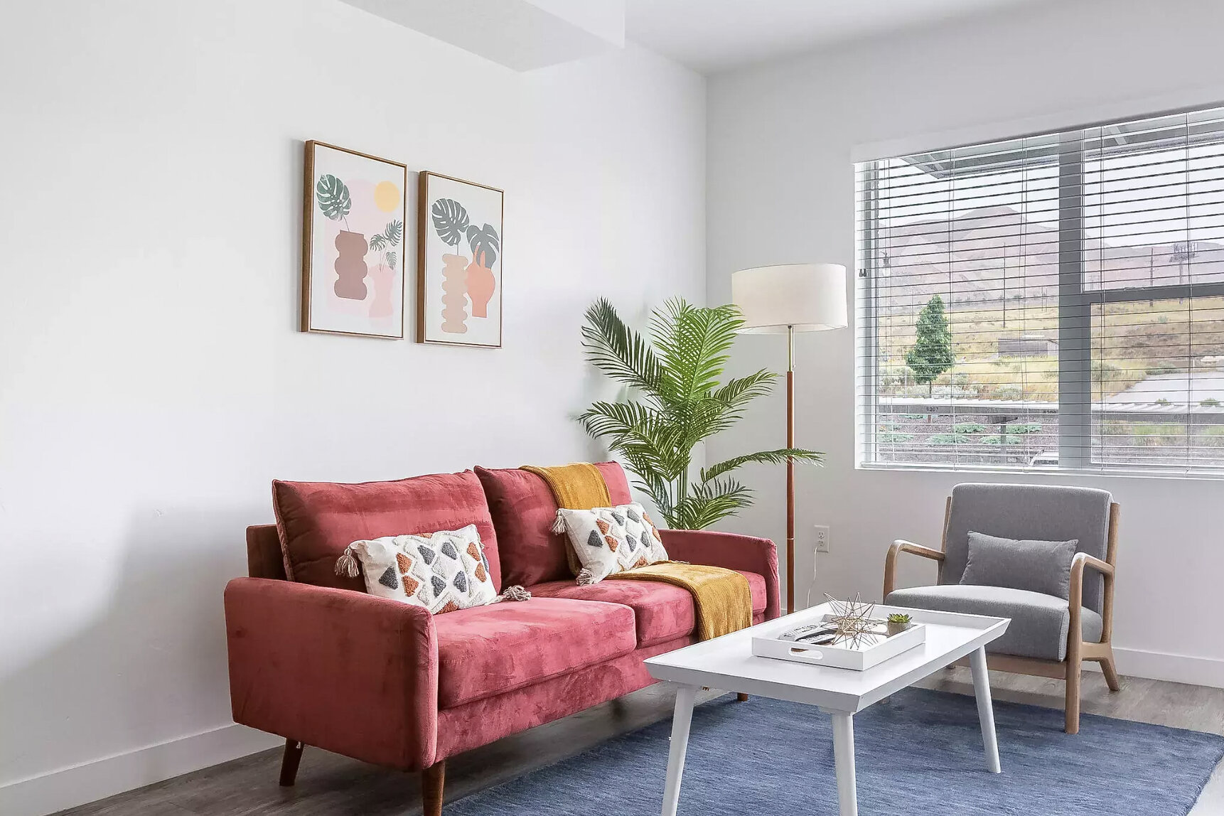 A Zeus Living two-bedroom apartment in Bluffdale, Utah, with a furnished living area and kitchen