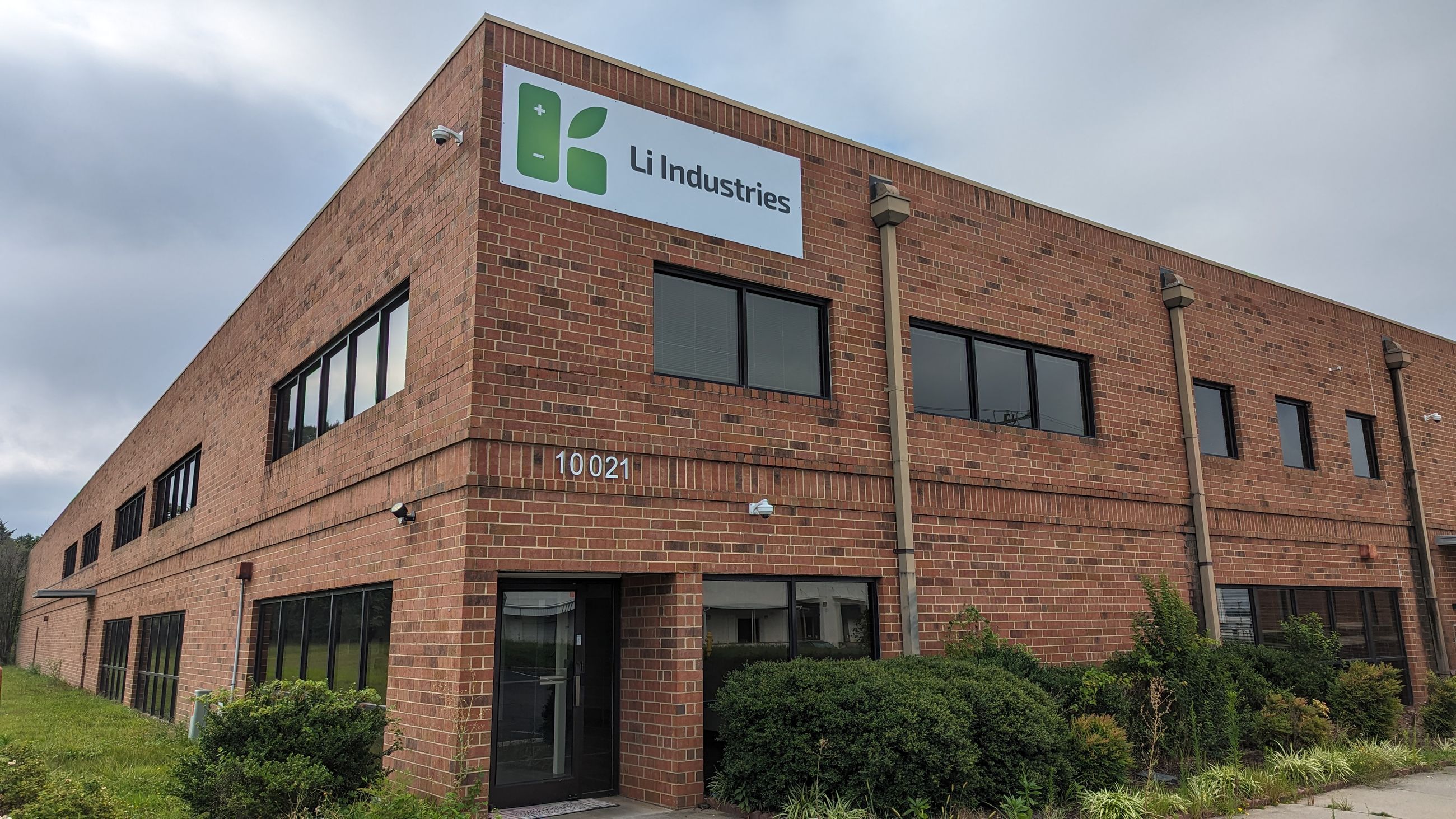 The brick Li Industries facility in Pineville, North Carolina, with the company sign above its entrance