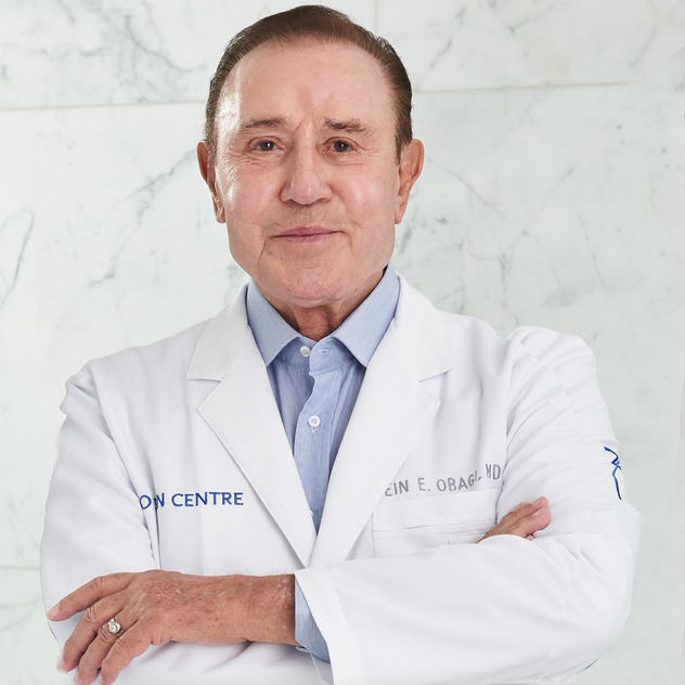 Zein Obagi wearing a white clinical coat
