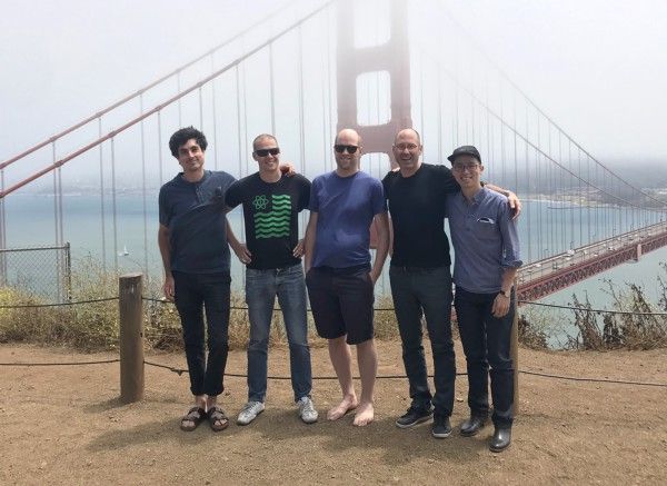 Zoltan Olah and four Chroma and Storybook colleagues standing together beside the Golden Gate Bridge