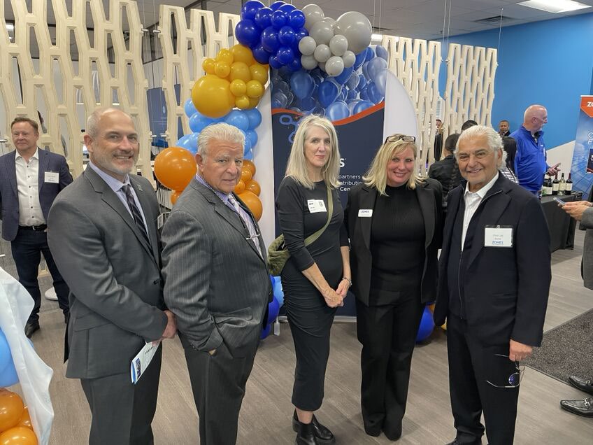 Guests pose together at the Zones Innovation Center opening event.