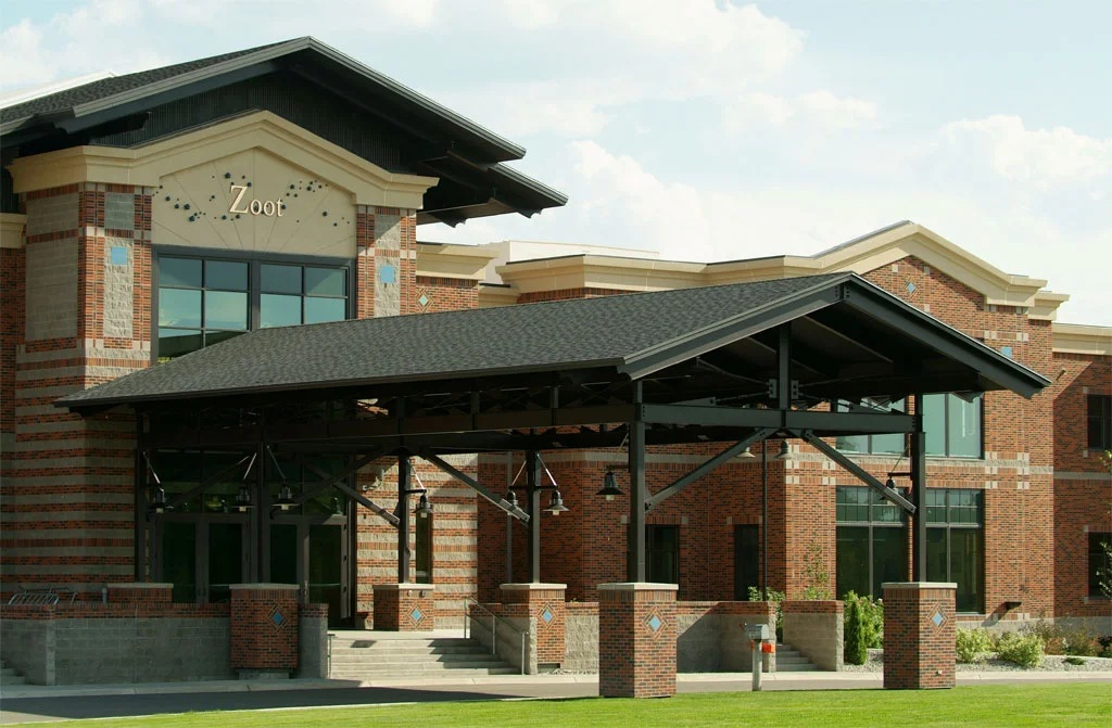 Brick and glass entrance to Zoot’s Montana headquarters