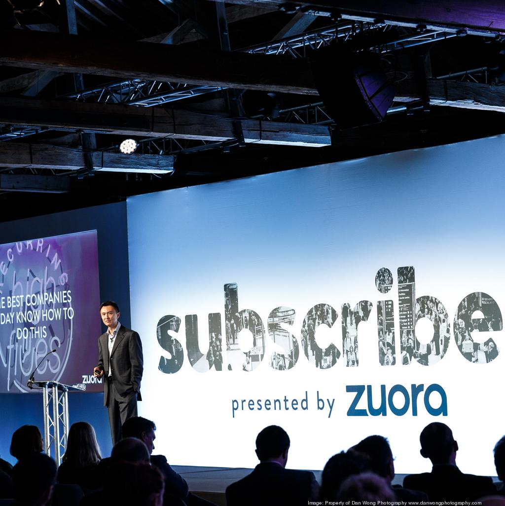 A Zuora Subscribed conference presentation in front of a large audience
