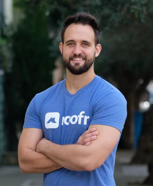 Richy Nelson, CEO of Roofr, wearing a Roofr polo shirt